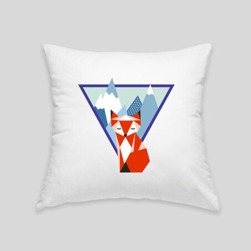 Mountain fox cushion featuring a geometric red fox design with mountains in the background, perfect for any cozy setting.